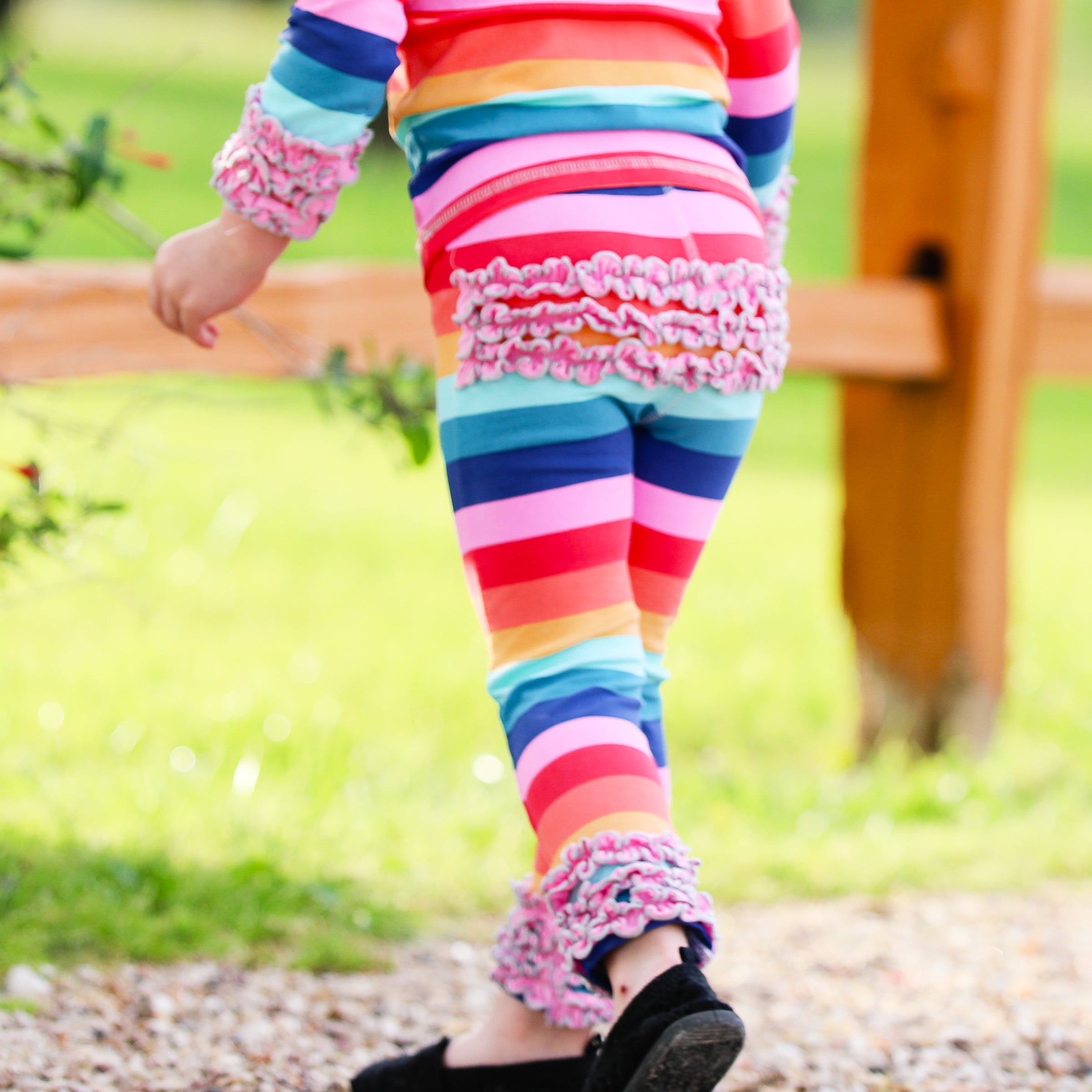AnnLoren Rainbow Ruffle Butt Leggings for girls, featuring ruffles on the butt and ankles, made from soft Egyptian cotton.